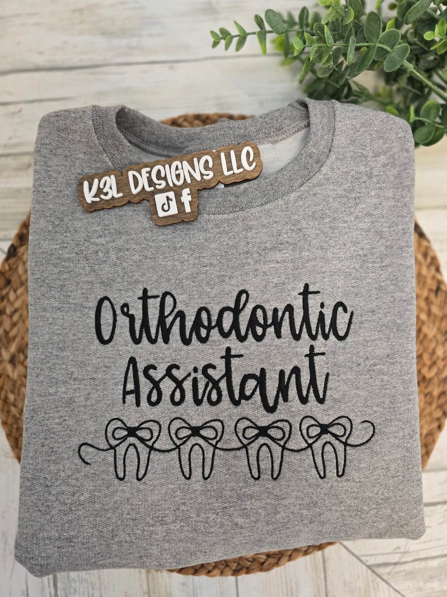 Embroidered Tooth Bow sweatshirt