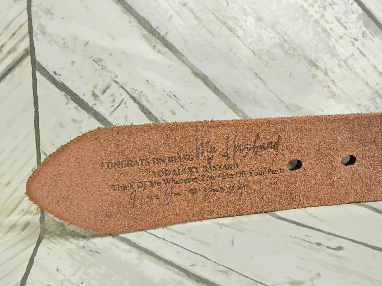 Engraved leather belt